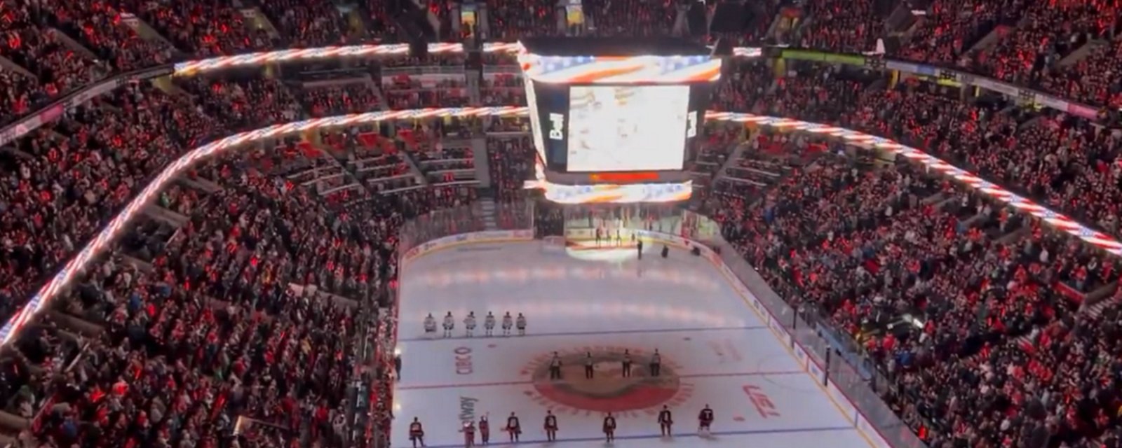 Canadian fans boo American national anthem during NHL game.