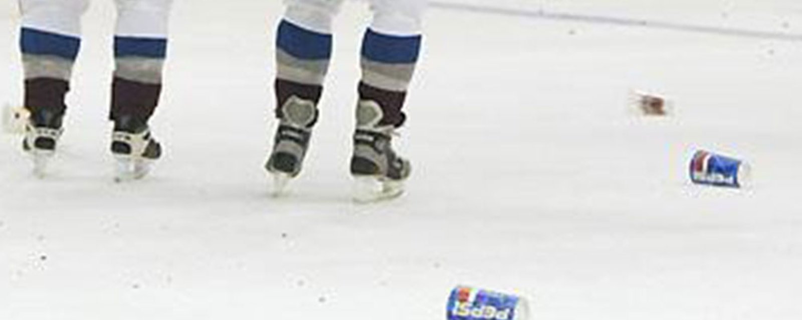 Players pelted with beer cans and garbage in two separate incidents in the NHL last night