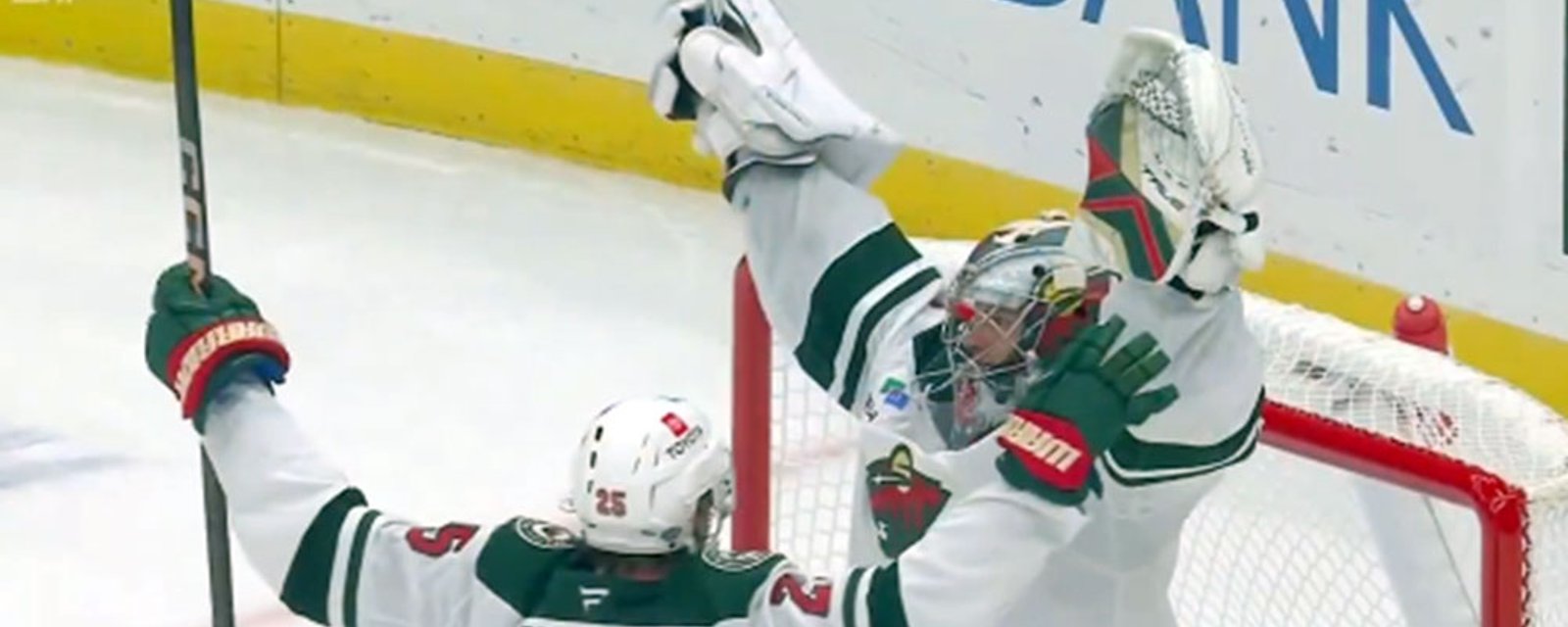 Wild goalie Gustavsson snipes a goal and celebrates with the boys on the bench!