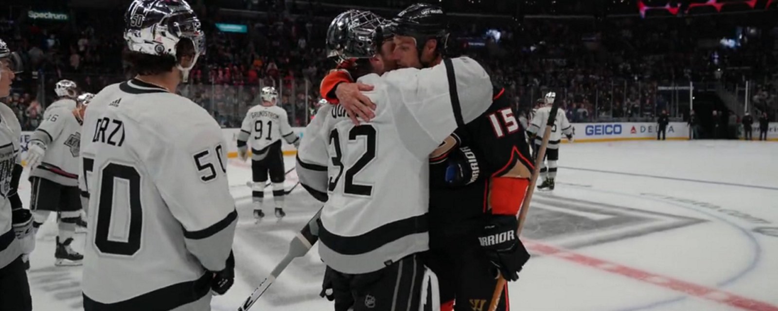 Long time rivals Ryan Getzlaf and Jonathan Quick embrace and mark the end of an era.