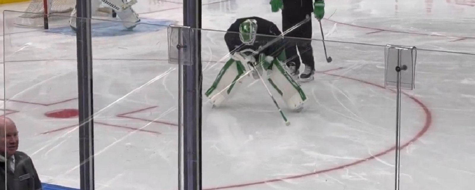 Ilya Samsonov hunched over in pain as he leaves the ice.