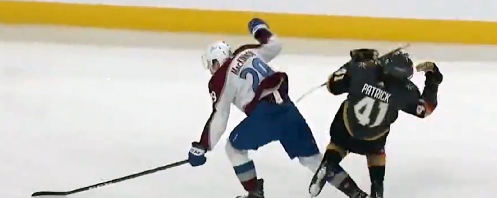 Nathan MacKinnon lays a high, dirty hit on Nolan Patrick 