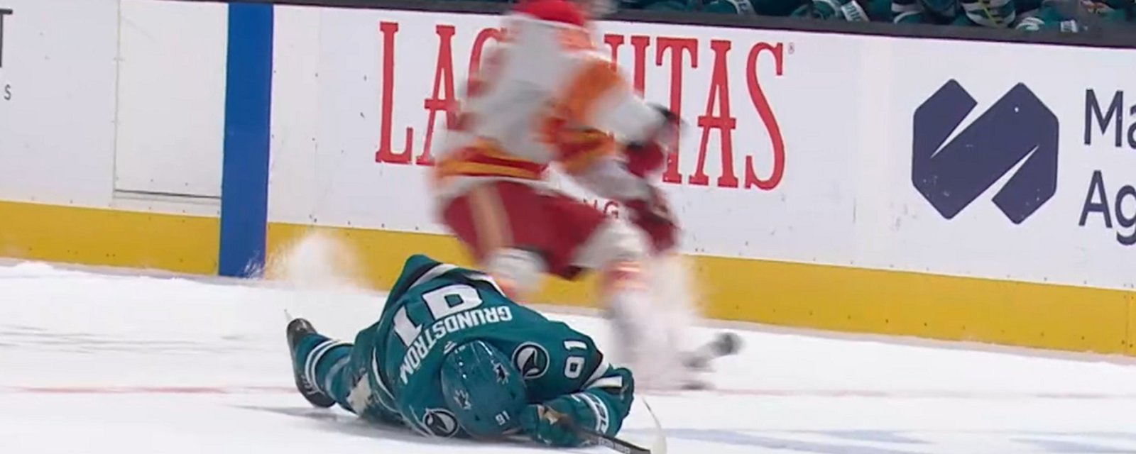 Pachal destroys Grundstrom with monster open ice hit.