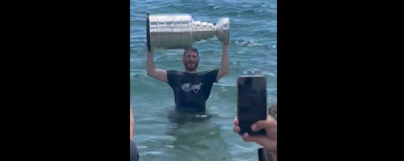 Matthew Tkachuk takes the Stanley Cup for a dip in the Atlantic Ocean