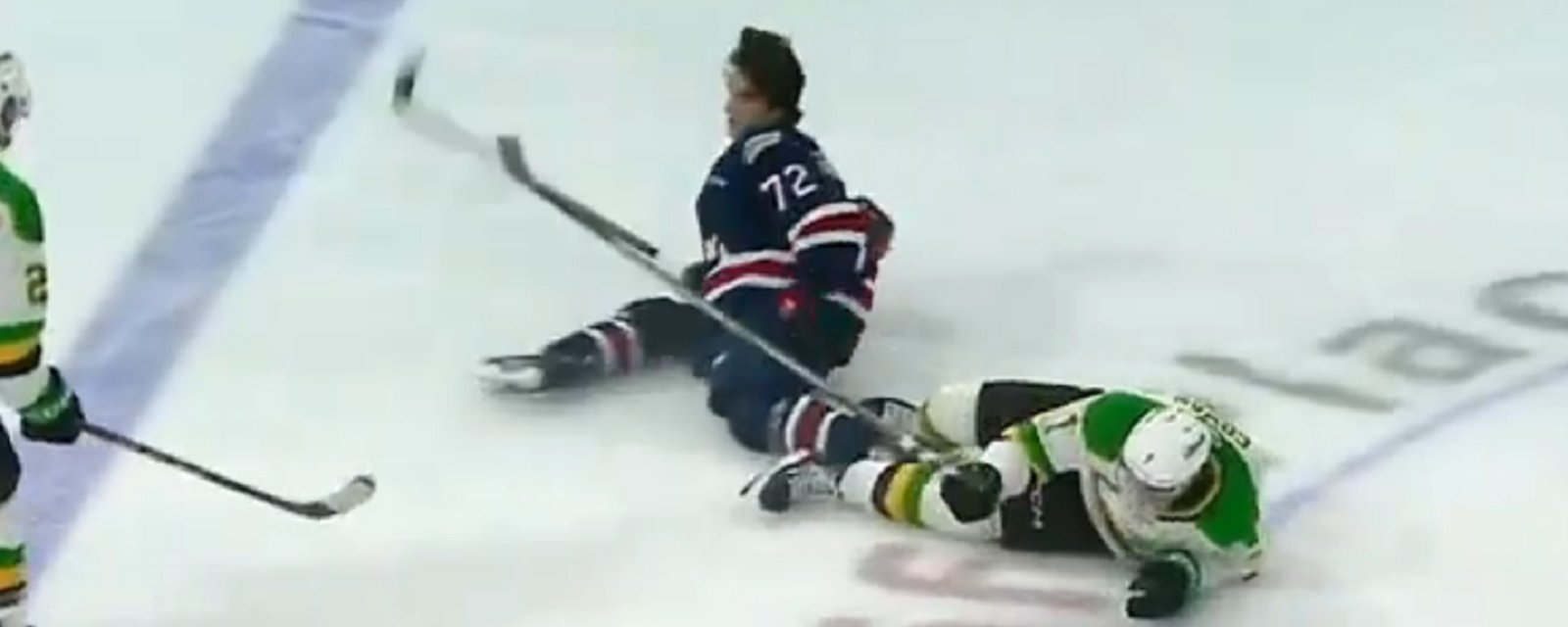 Leafs top prospect Easton Cowan leaves game after huge hit.