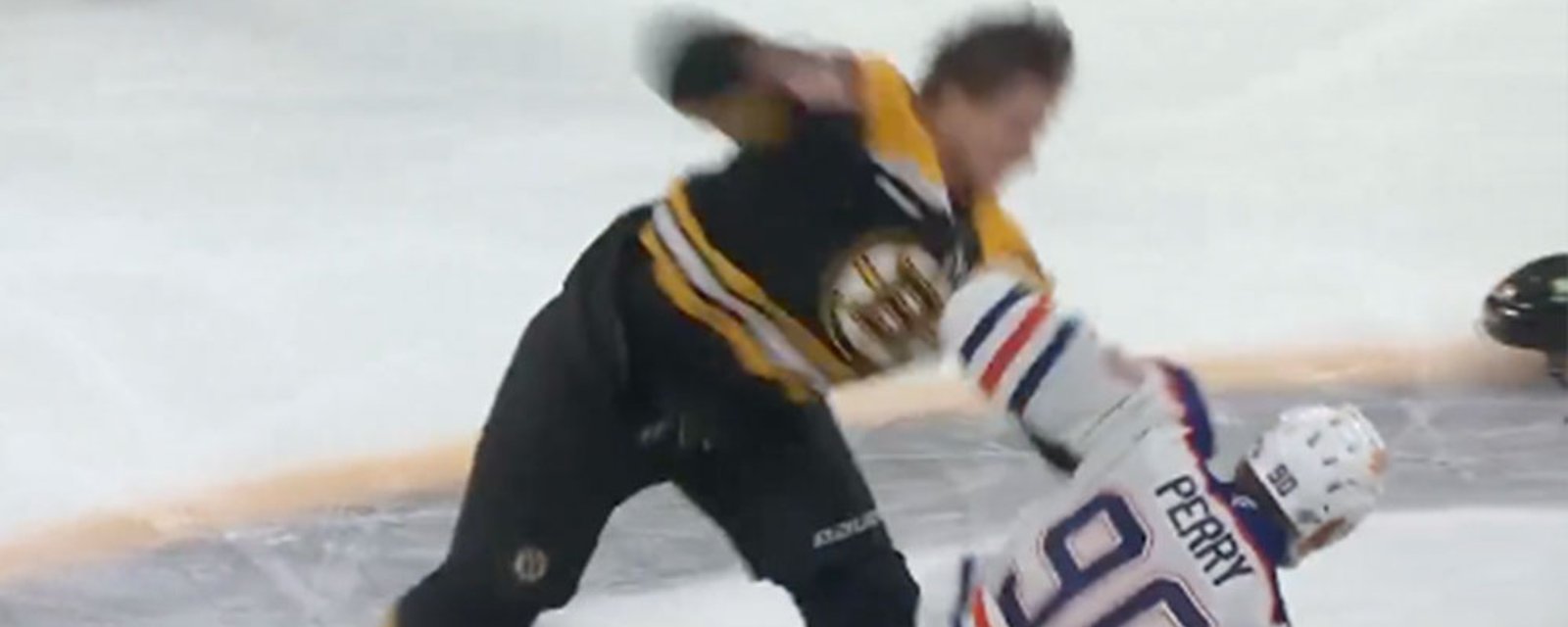 Trent Frederic uses Corey Perry as a punching bag in spirited bout at center ice!