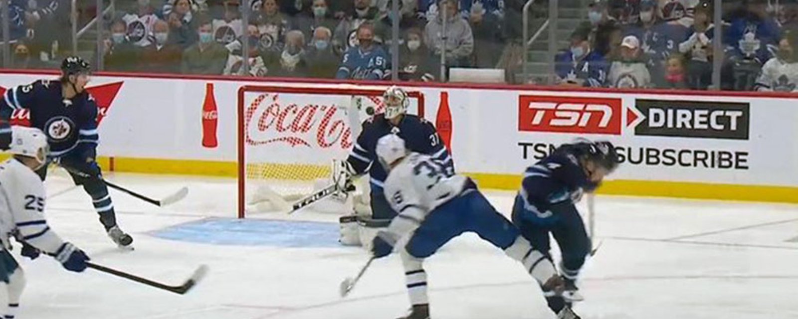 Jets' Neal Pionk suspended for kneeing Leafs' Rasmus Sandin