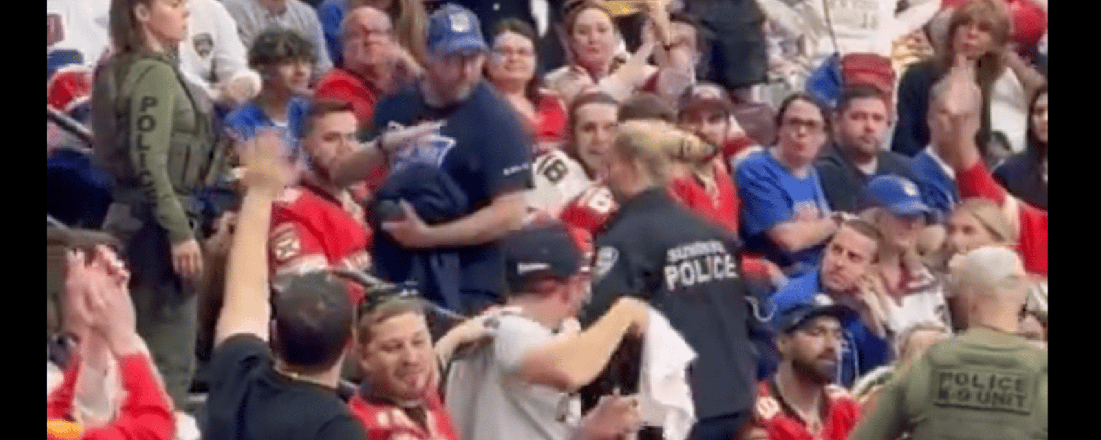 Panthers fans jeer Rangers fan ejected by police 