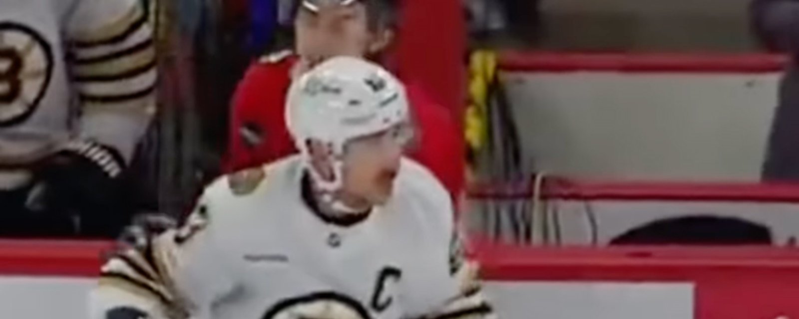 Brad Marchand goes after Connor Bedard again in Bruins-Hawks 2nd game of the season