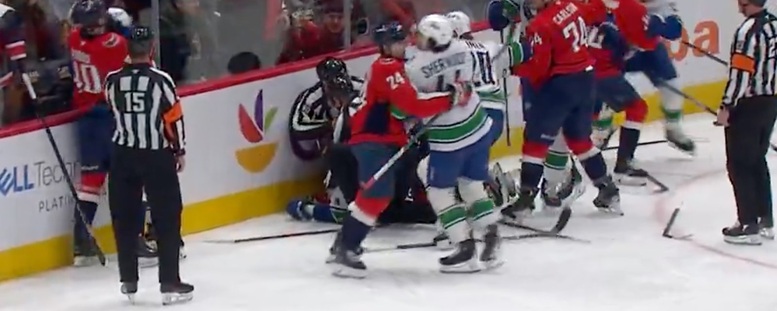 Crazy brawl between Canucks and Capitals results in multiple penalties!