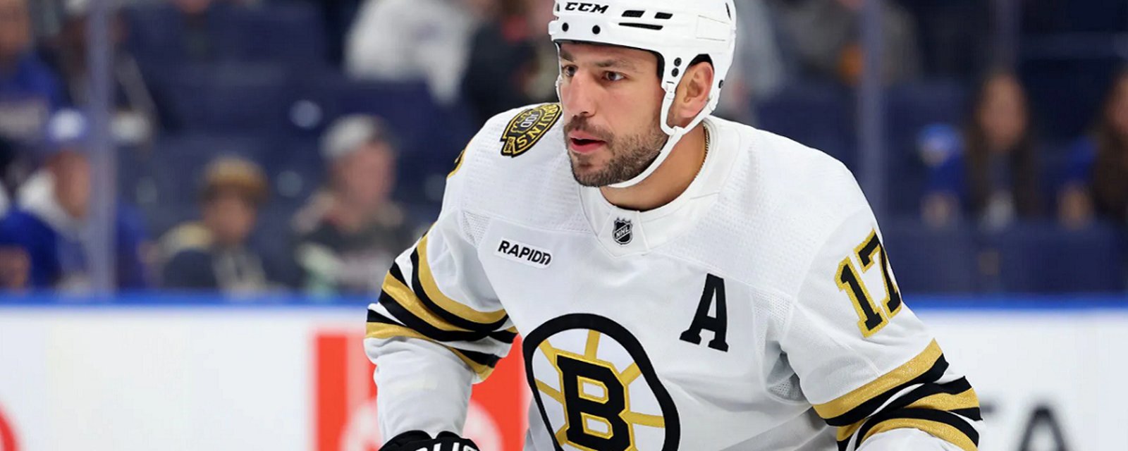 First look at Milan Lucic's mugshot following arrest.