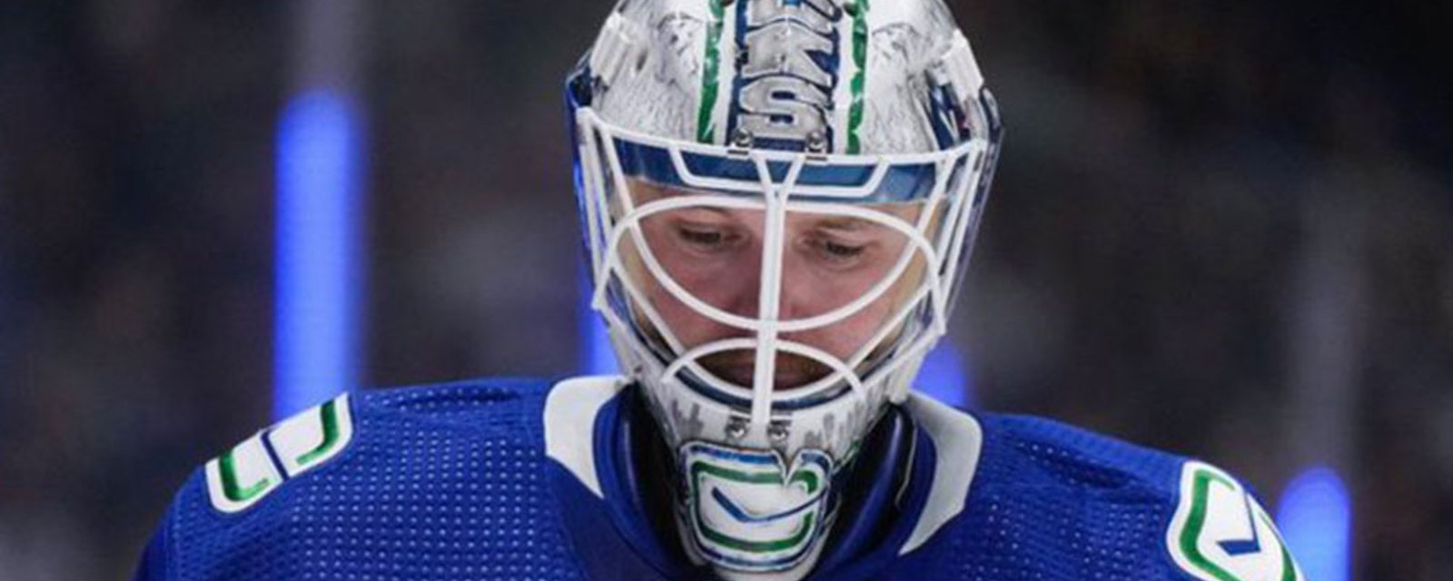 Canucks goalie Thatcher Demko pukes in his own mask during play