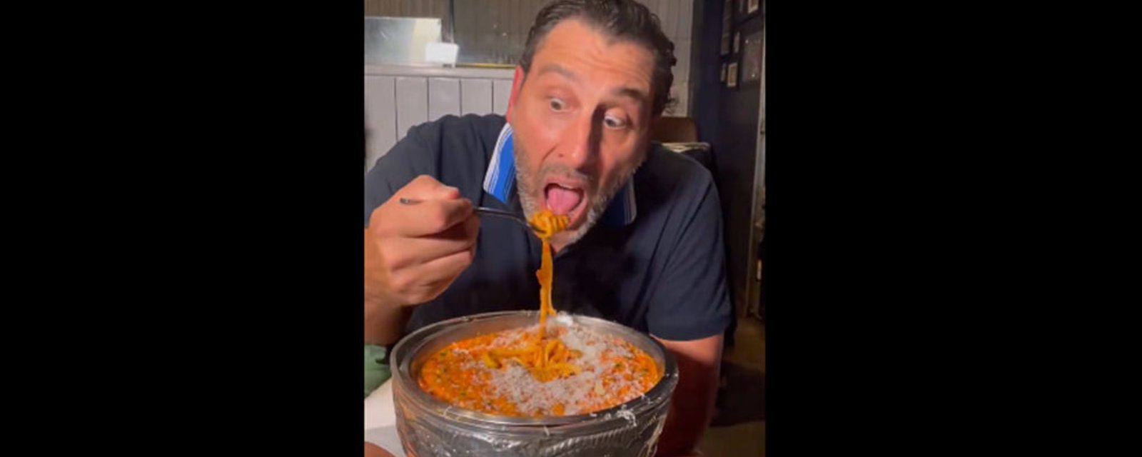 Roberto Luongo eats spaghetti out of the Stanley Cup