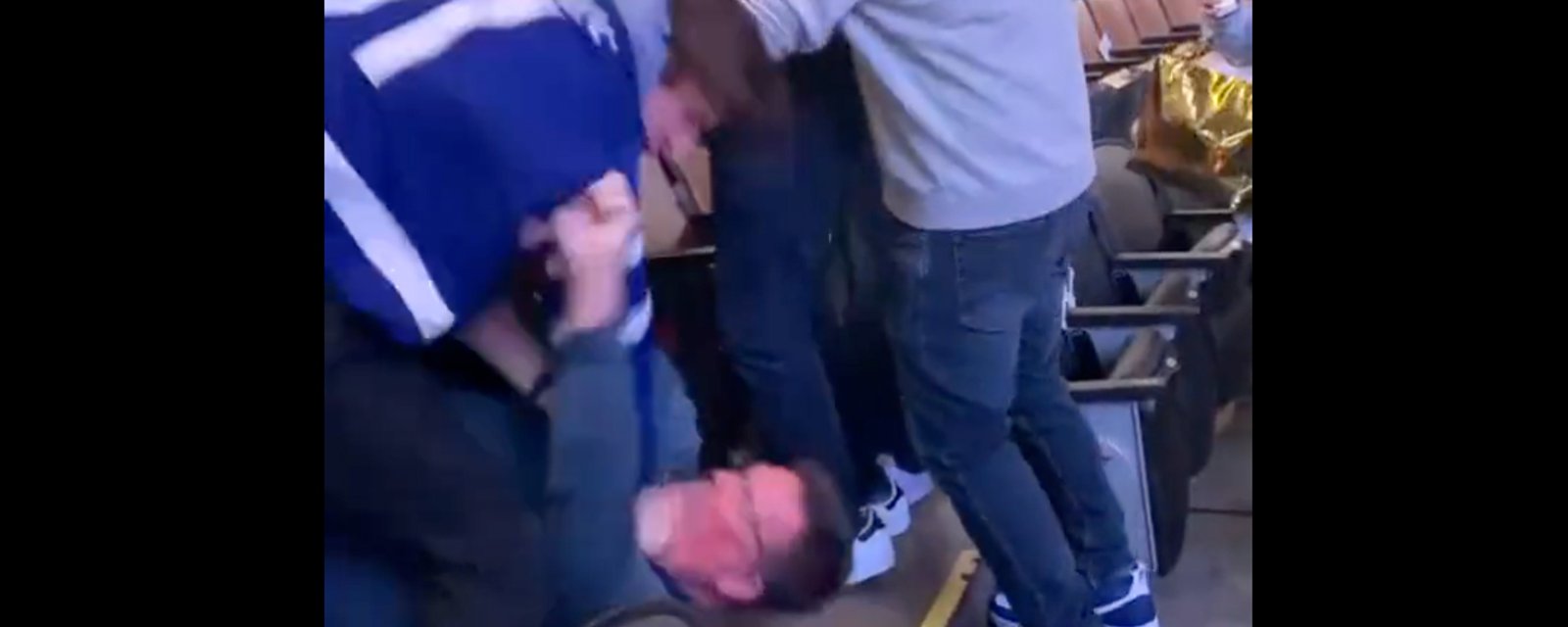 Leafs’ fan gets clobbered after allegedly putting his hands on a woman in the stands!