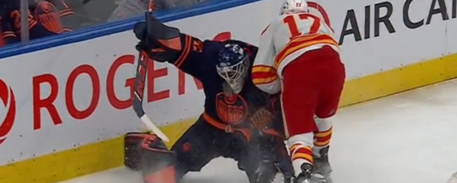 Milan Lucic runs over Mike Smith in Game 3!