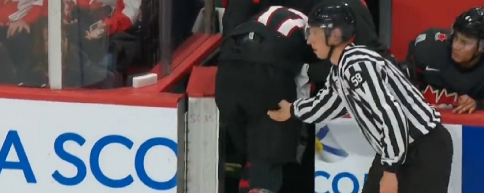 Colton Dach suffers nasty looking injury at the World Juniors.