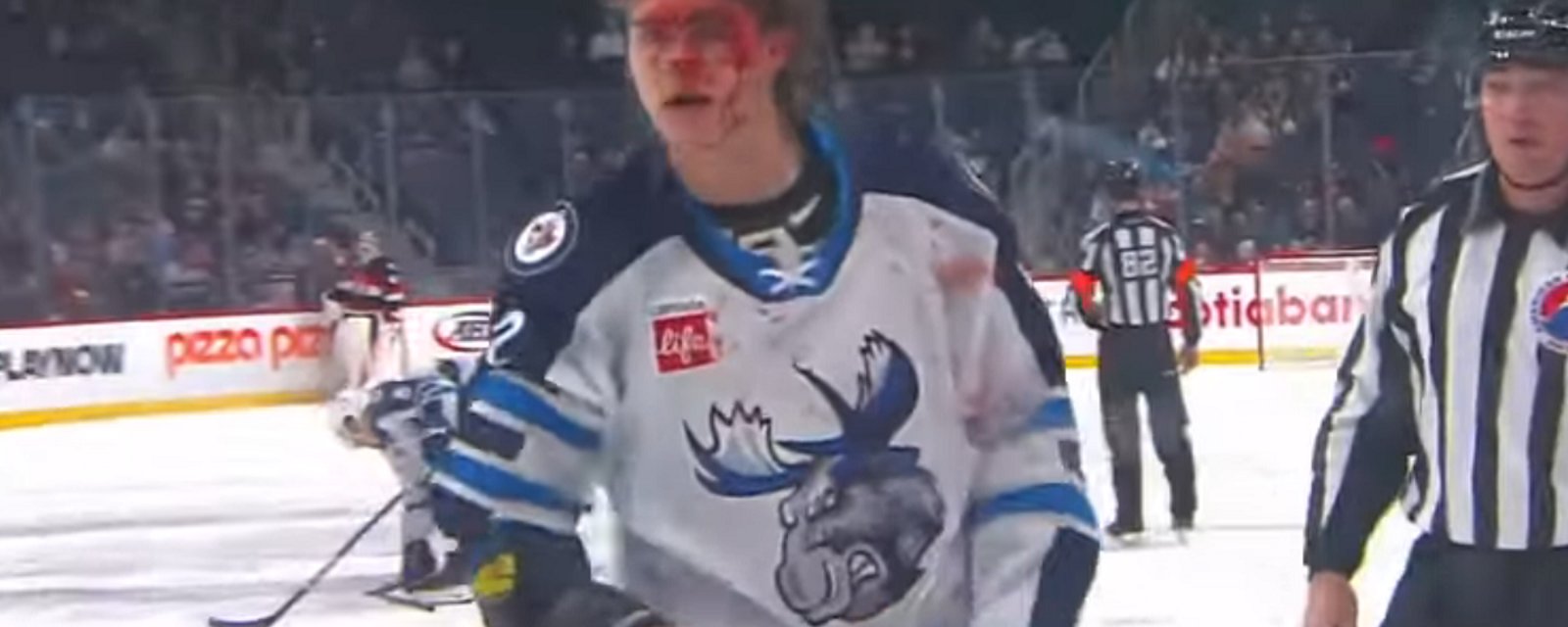 Boko Imama rearranges Tyrel Bauer's face on the ice.