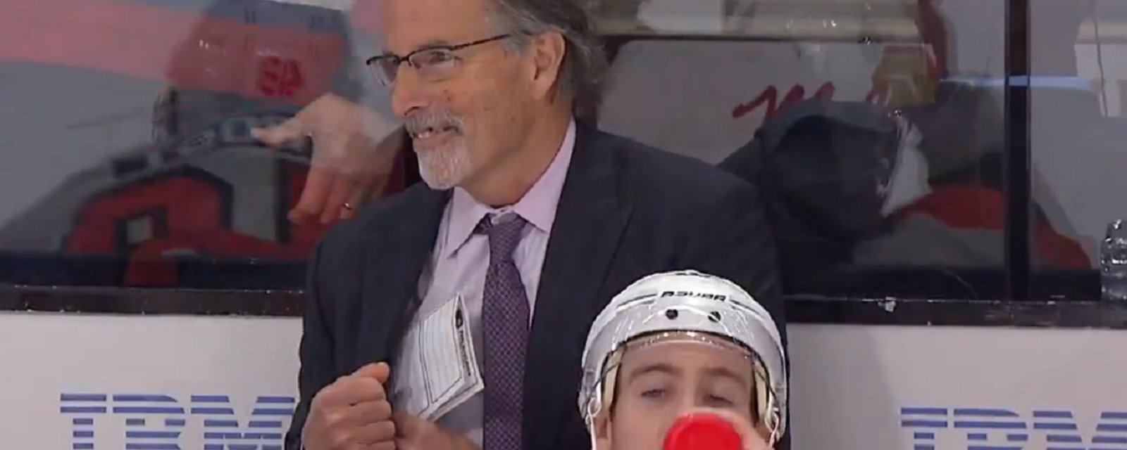 Cole Caufield makes John Tortorella crack a smile.