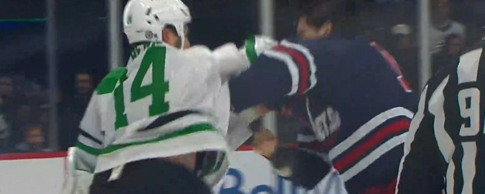 Jamie Benn and Adam Lowry drop the gloves in captain vs captain showdown.