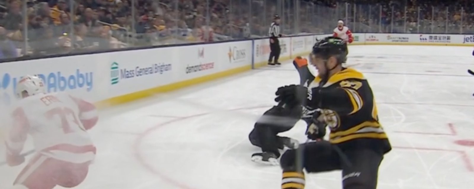 Ref Joannette’s leg bends the wrong way: he needs to be escorted off the ice