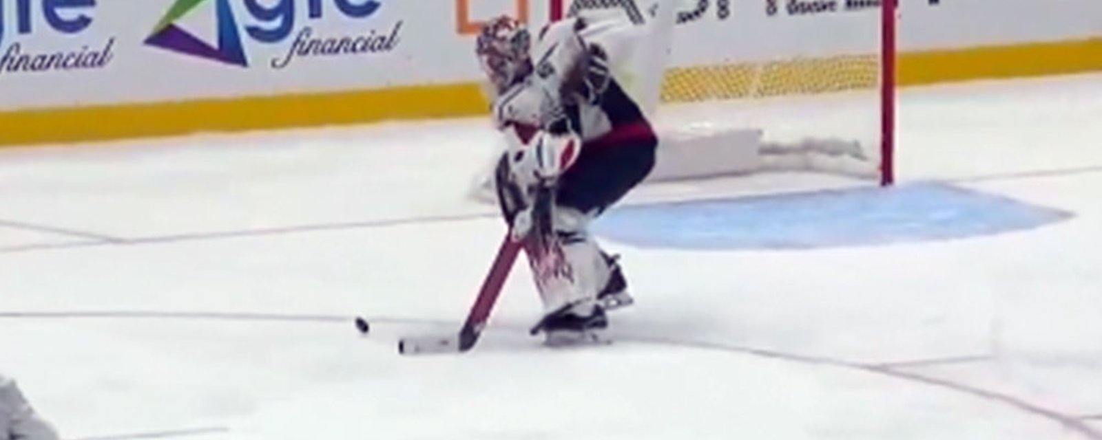 Charlie Lindgren fires the puck into his own net!