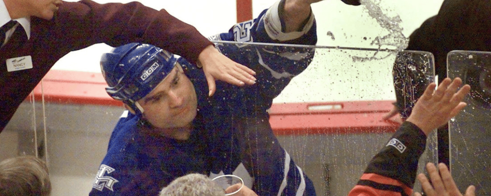 Fan crashes penalty box with Tie Domi 22 years ago! 