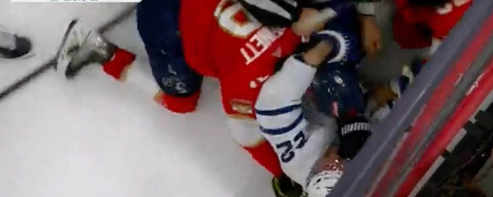 Chaos breaks out at the buzzer with Bennett sucker punching defenseless McCabe