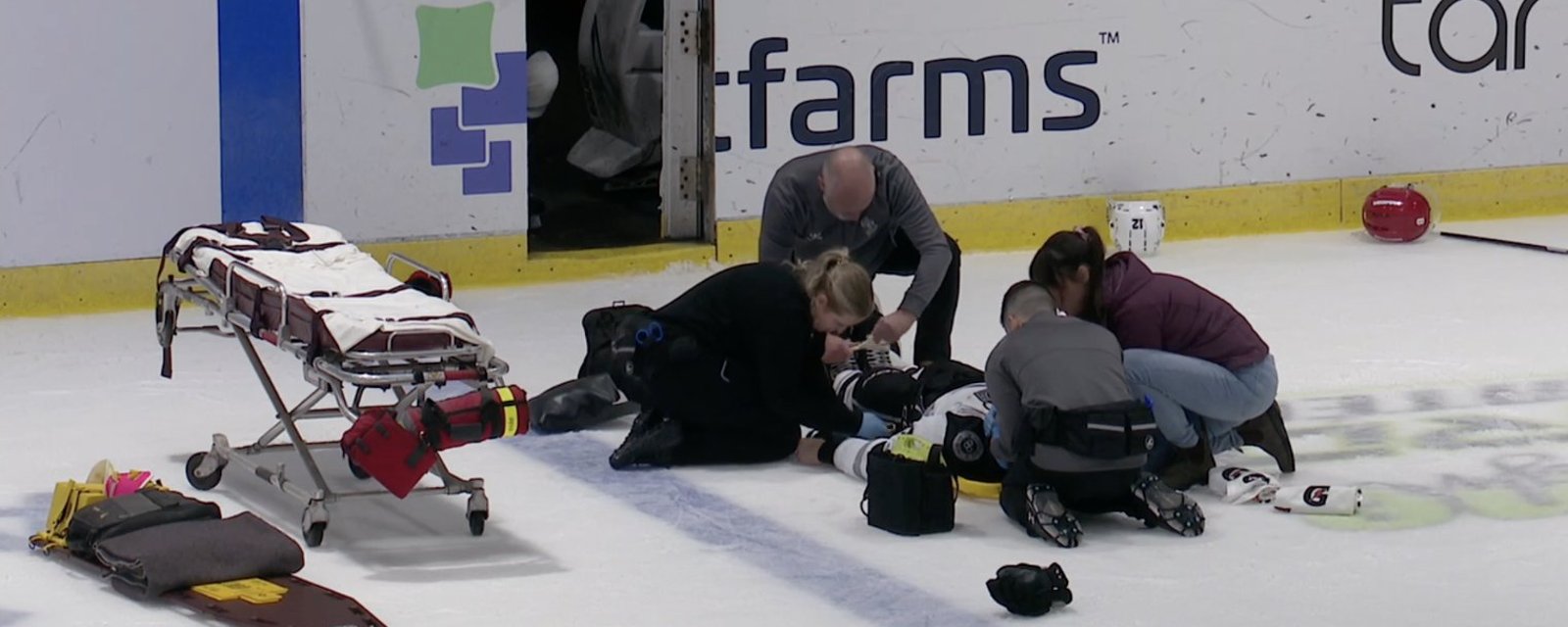 17-year-old Justin Blais convulses on the ice after hitting his head and is stretchered out