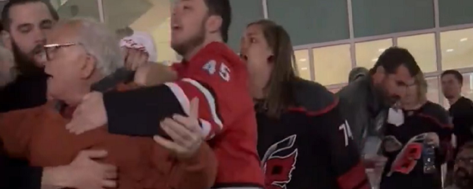 Fan knocked out after Game 4 between Canes and Rangers. HockeyFeed