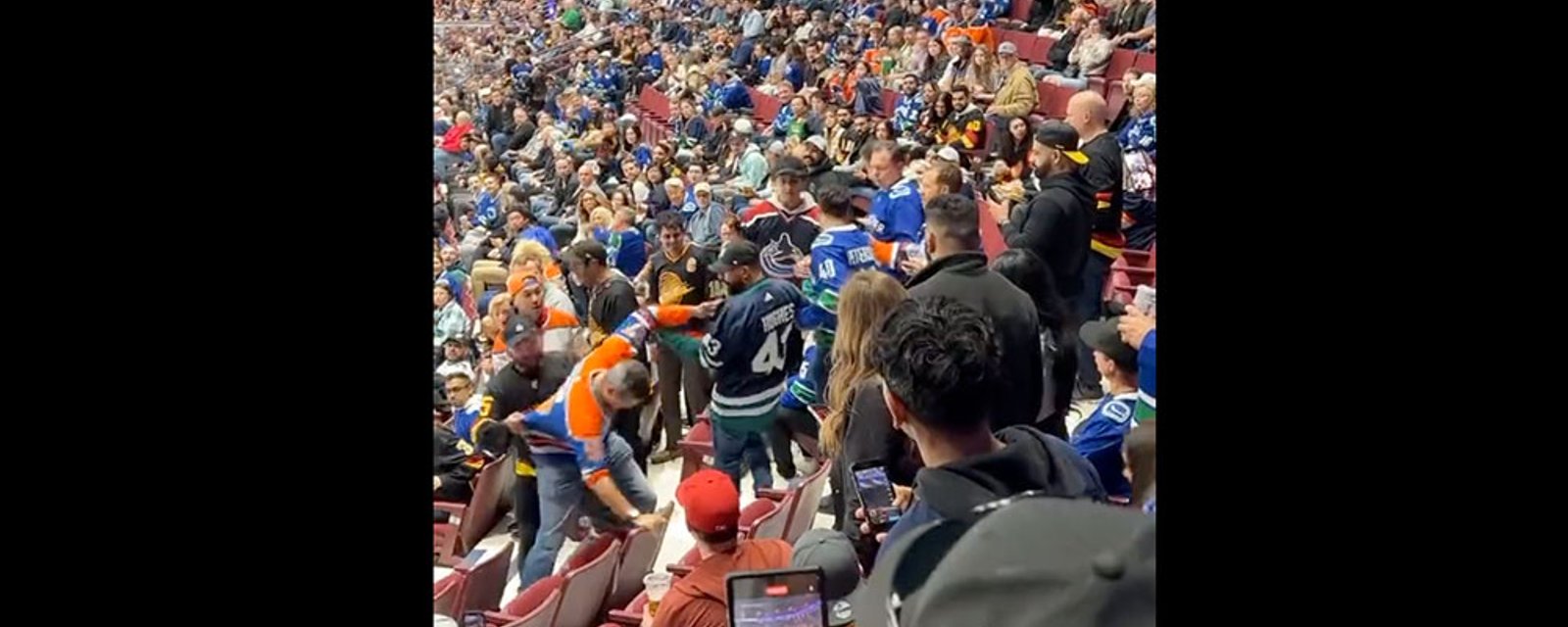 Canucks and Oilers fans start a brawl last night in Vancouver