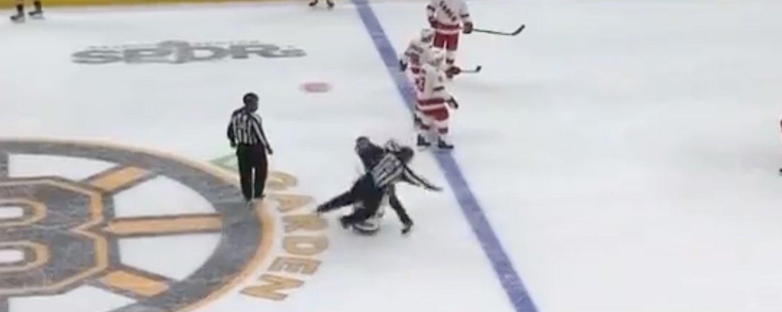 Bruins ice employee collides with official during Game 3