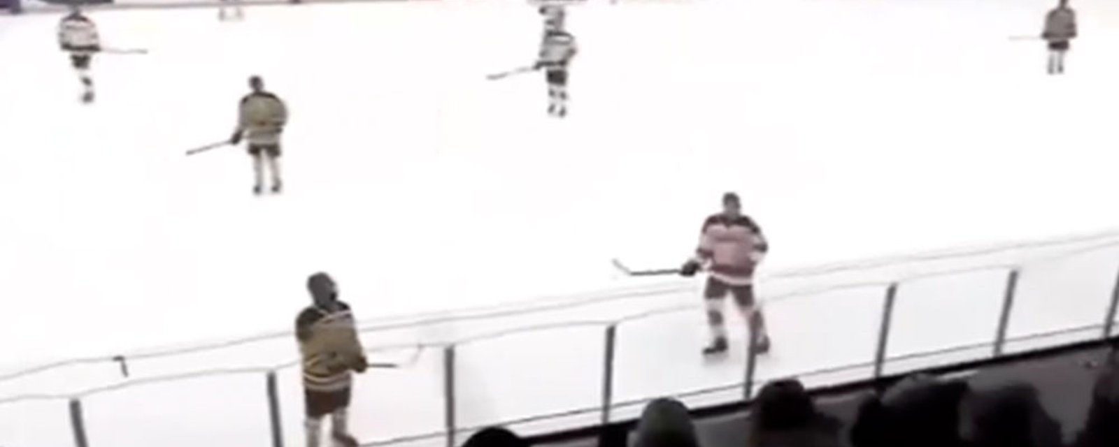 High school announcer goes viral for wild reaction to nearly getting hit by puck