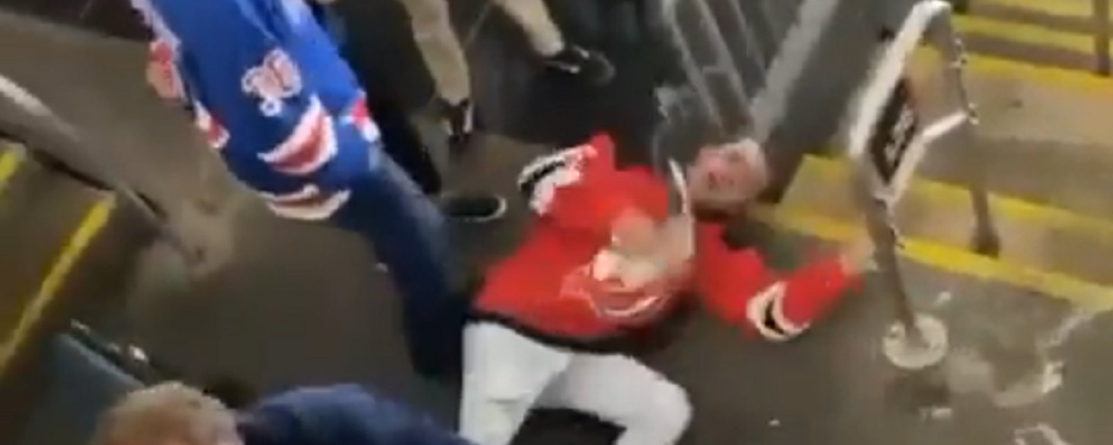 Devils fan choked unconscious after assaulting Rangers fan.