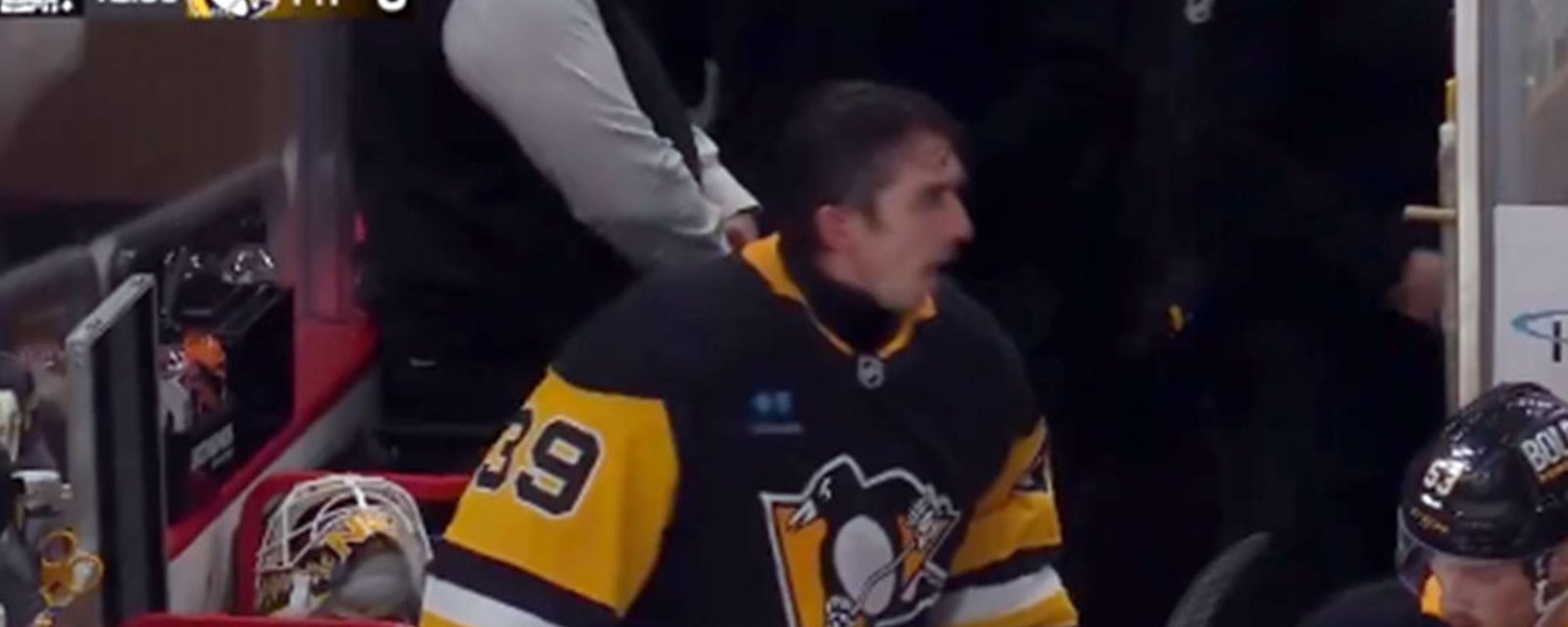 Nedeljkovic smashes his stick, slams the bench door and screams at his teammates after getting pulled