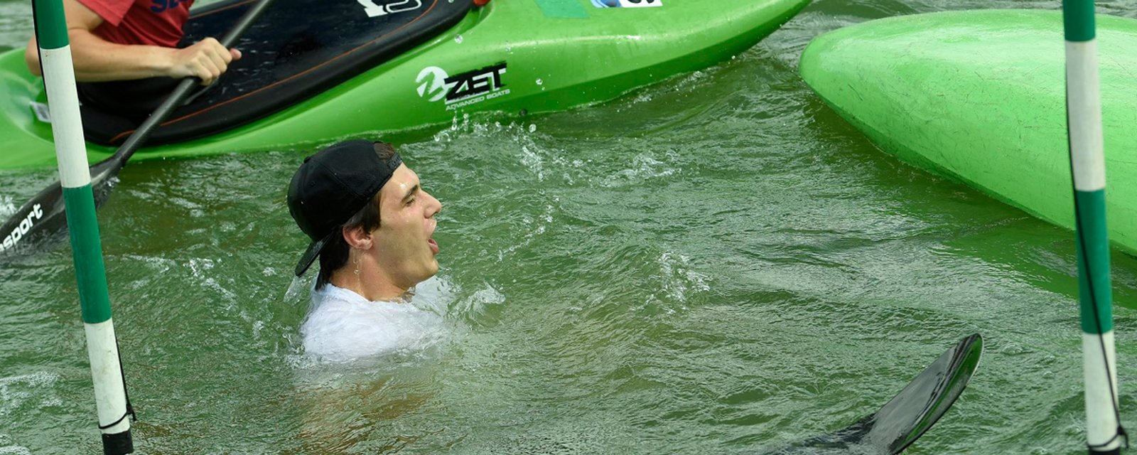 Juraj Slafkovsky tries his luck at kayaking... goes swimming.