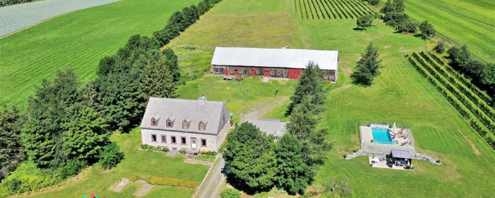 Immense vignoble et exceptionnelle maison de 1700 dans la campagne bucolique de l'Île d'Orléans