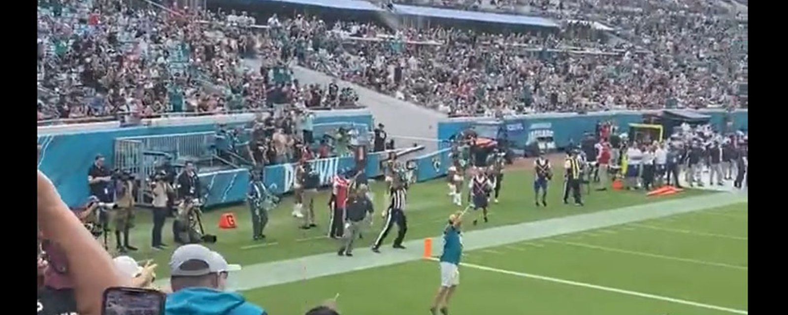 WATCH: Jaguars fan runs onto the field, gets tackled by security! 