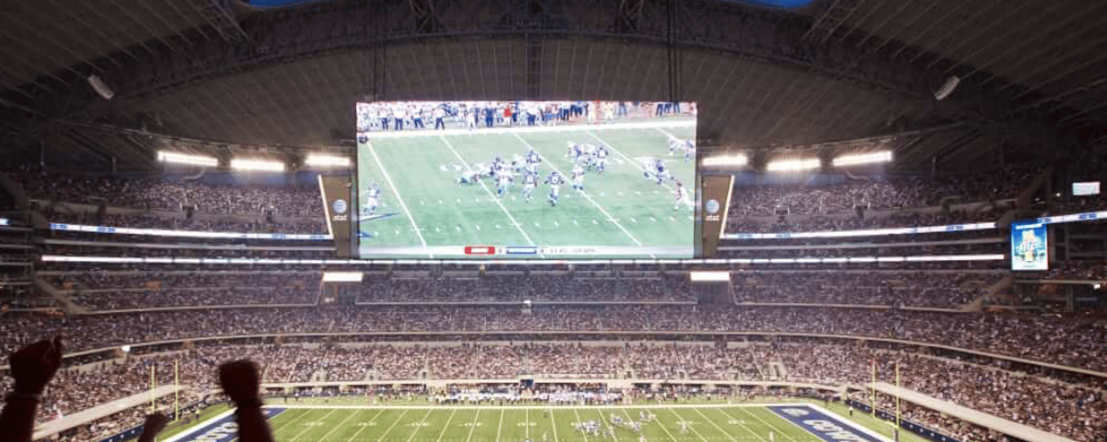 AT&T Stadium employee arrested for illegally allowing fans into building 