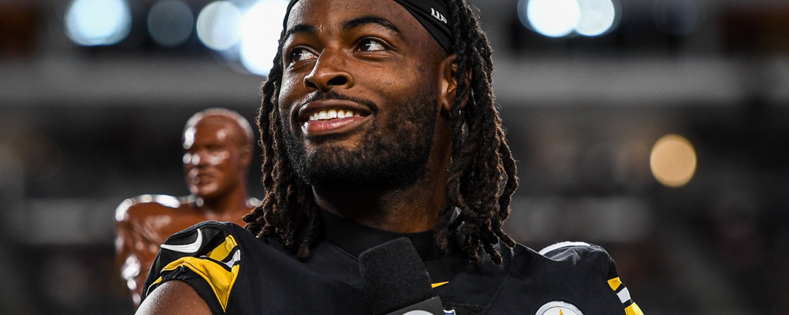 Najee Harris receives award during halftime of Steeler's preseason opener