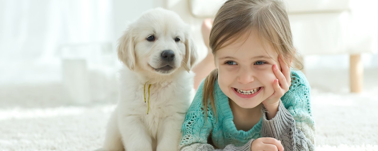 Les enfants qui ont un chien sont plus heureux et ont plus de succès