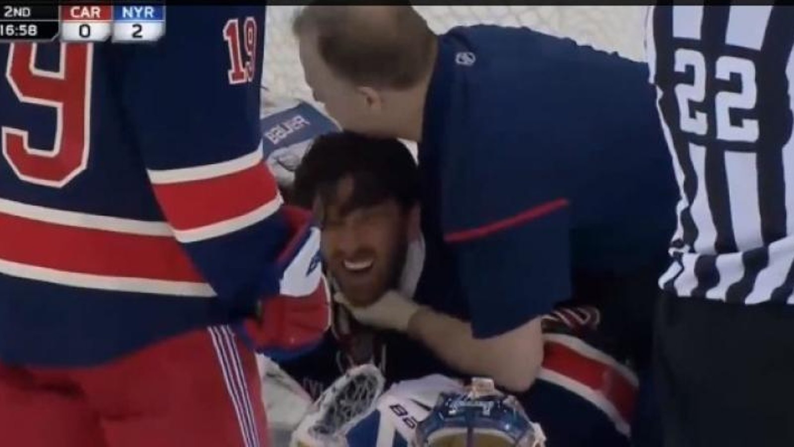 (VIDEO): Henrik Lunqvist gets a scare after getting a puck in the throat!