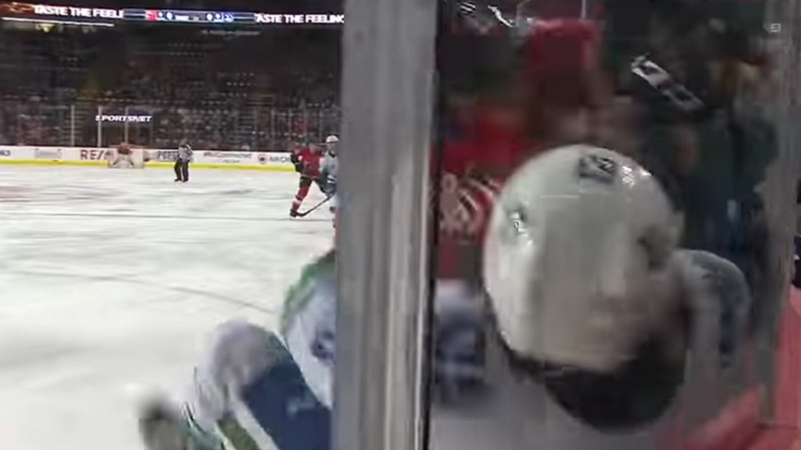 Tanner Glass crushes his opponent against the boards, and scores while he's still down!