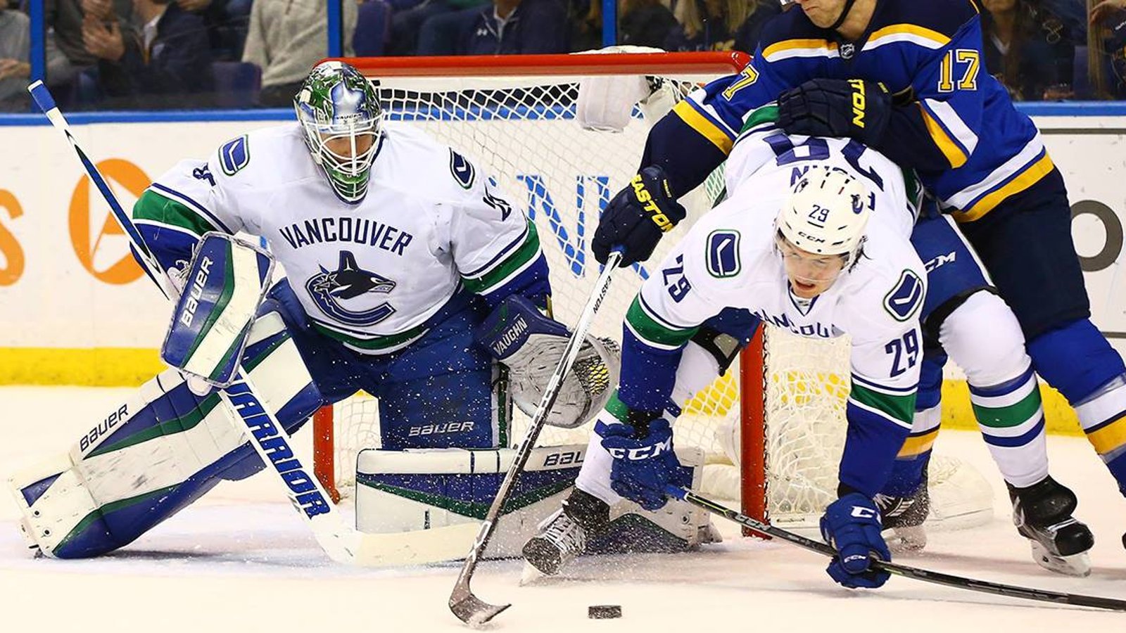 Canucks cut mammoth defenseman, two others clear waivers