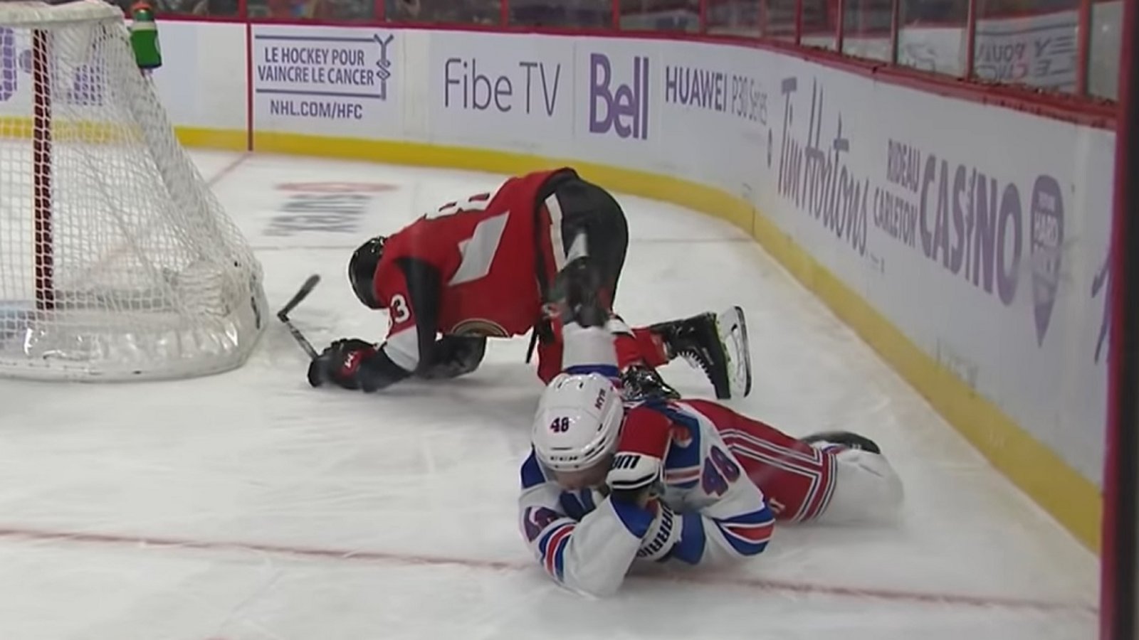 Brendan Lemieux loses his teeth after getting hit in the face by Christian Jaros.