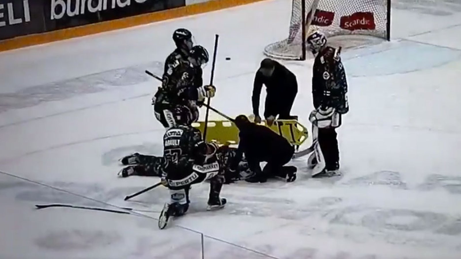 Canes top prospect Patrik Puistola stretchered off the ice after nasty hit! 
