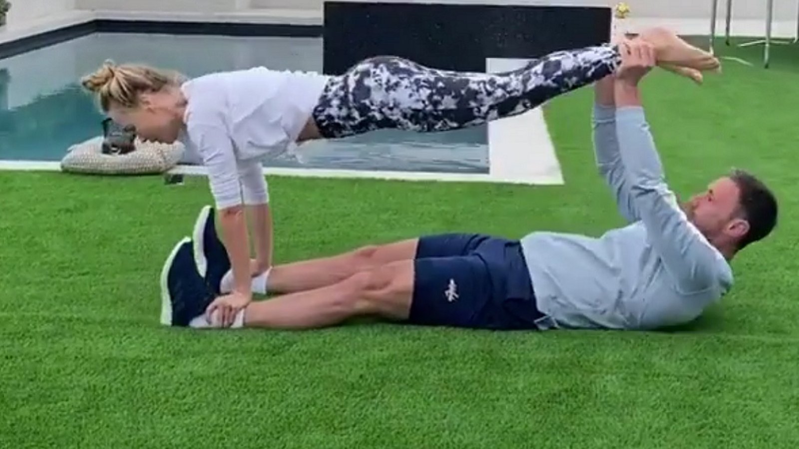 Ilya Kovalchuk uses his wife as improvised workout equipment during COVID-19 lockdown.