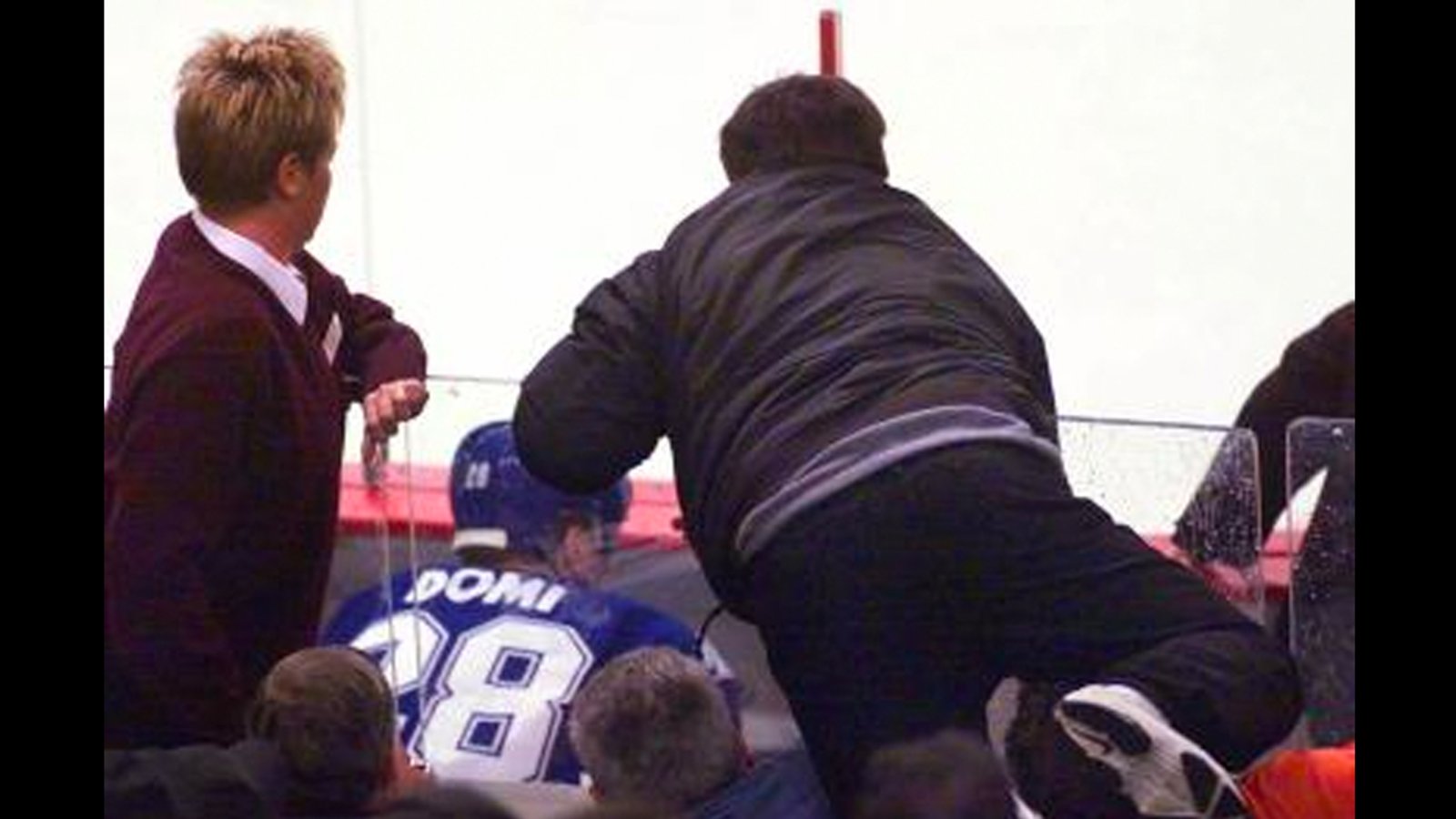Throwback: Domi beats the wheels off a Flyers fan in the penalty box!