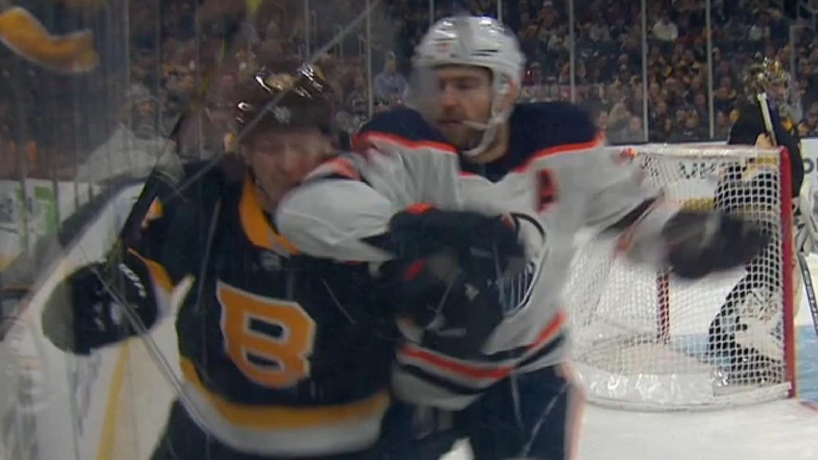Leon Draisaitl delivers a blatant elbow to the head of Torey Krug.