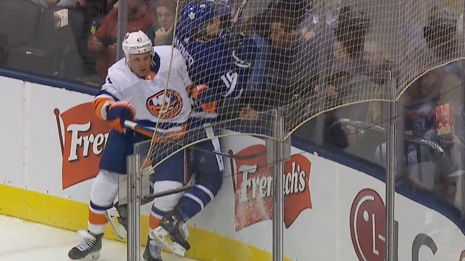 Leo Komarov hits former teammate Mitch Marner right in the numbers.