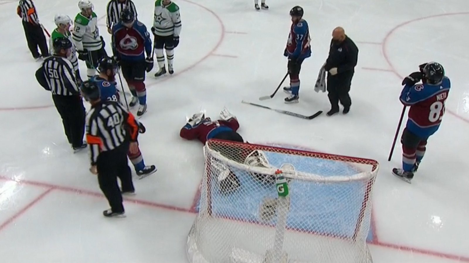 Philipp Grubauer carried off the ice after suffering a serious looking injury.